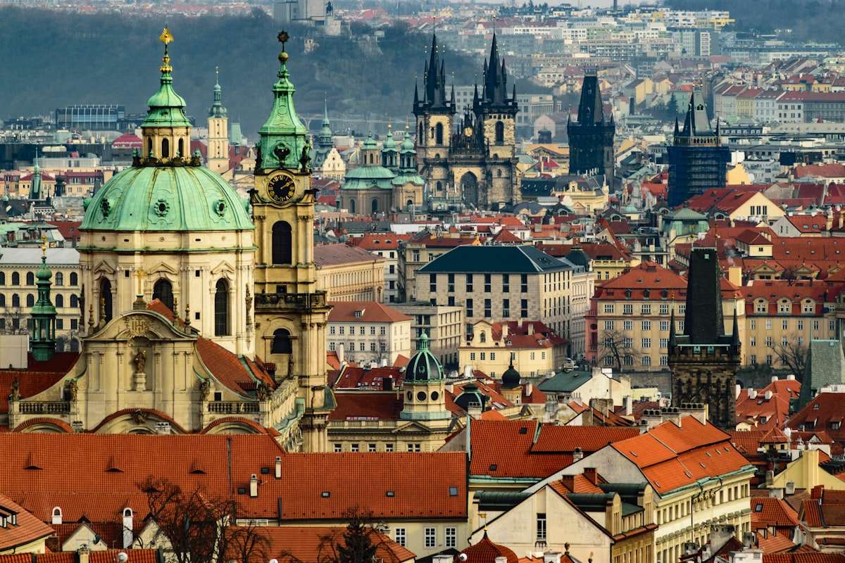 Charles Bridge in Prague at sunset over the Vltava river